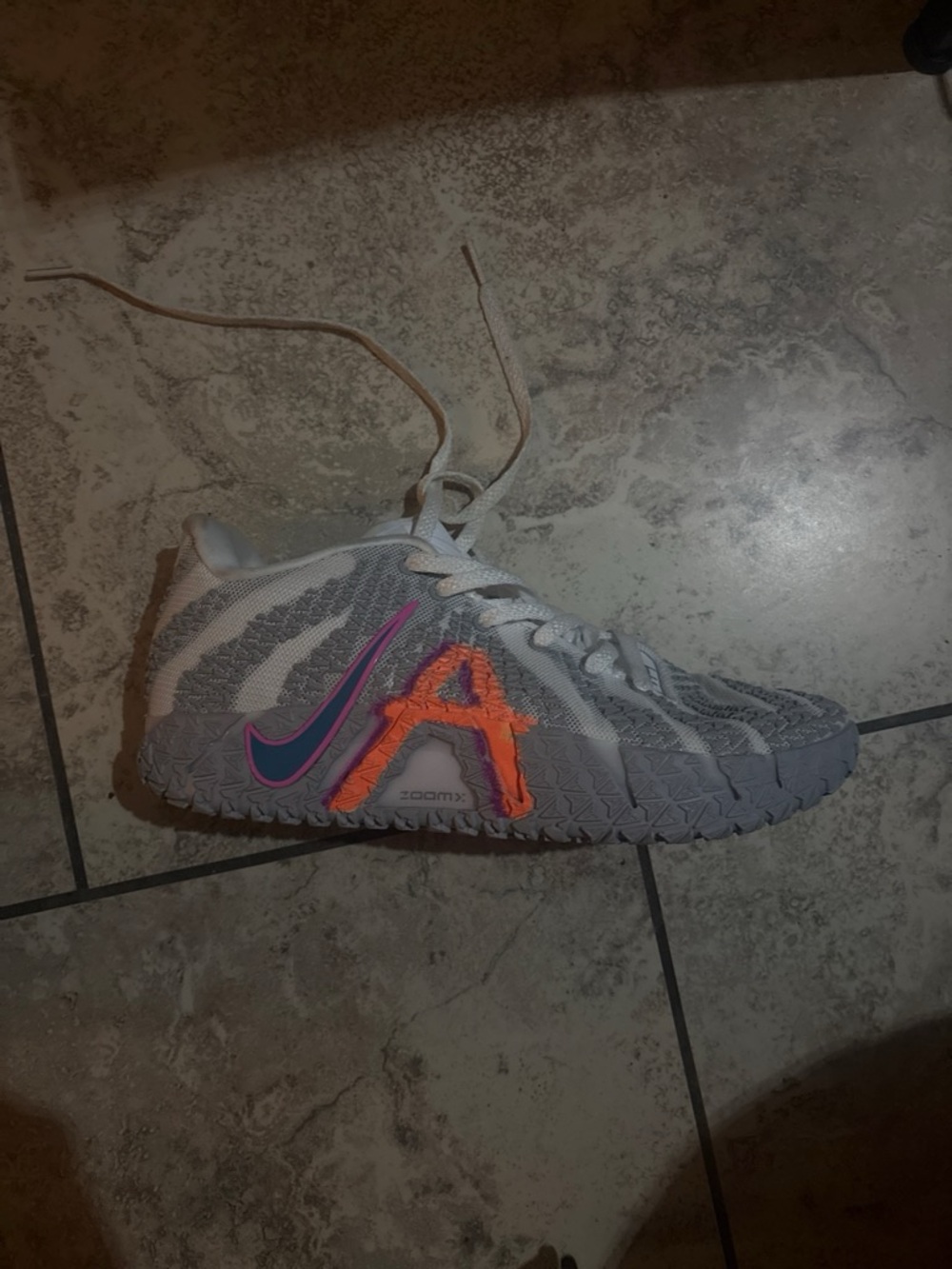 Nike Kids Gray Sneaker with Orange and Pink Accents